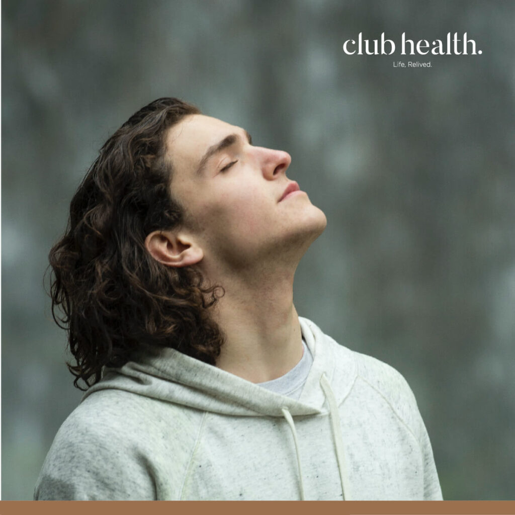 man doing breathing exercises 